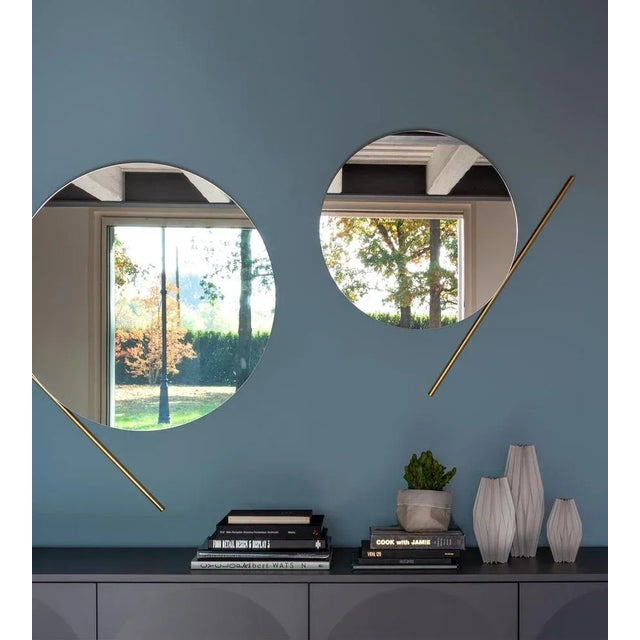 Small Chic Mirror by Morica Design Dimensions: D 2.2 x W 62 x H 80 cm. Materials: Mirror, brass. Round mirrors in silver...