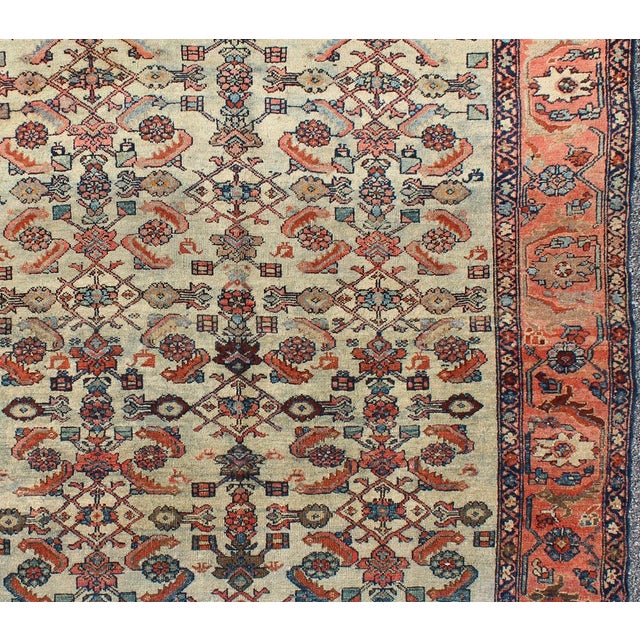 Measures: 5'2 x 5'10. Antique Persian Malayer rug with all-over sub-geometric design in red and blue. Keivan Woven Arts /...