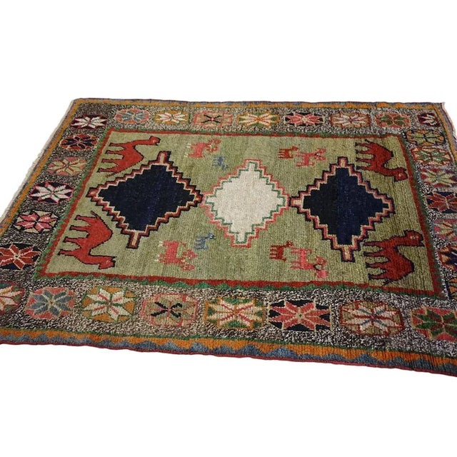 Tribal 1920s Green Tribal Camel Animal Antique S. Persian Gabbeh Carpet 4' X 6'3" Knotted Wool Rug For Sale - Image 3 of 9