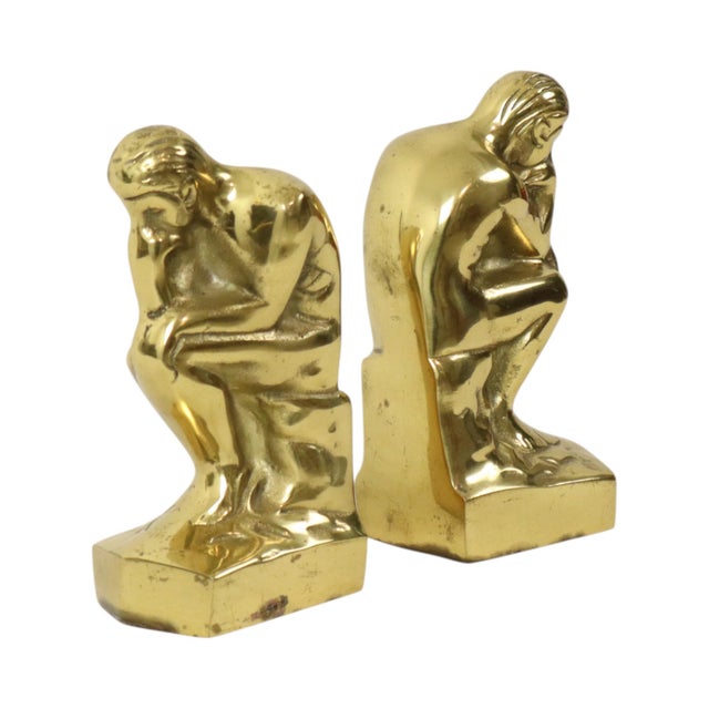 Mid-century Italian brass bookends based on ‘The Thinker’ by French sculptor Auguste Rodin, by Regina Italy, circa 1960s....