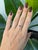 A natural colour-change alexandrite glows at the centre of this solid 14K yellow gold ring, flanked by two earth-mined...