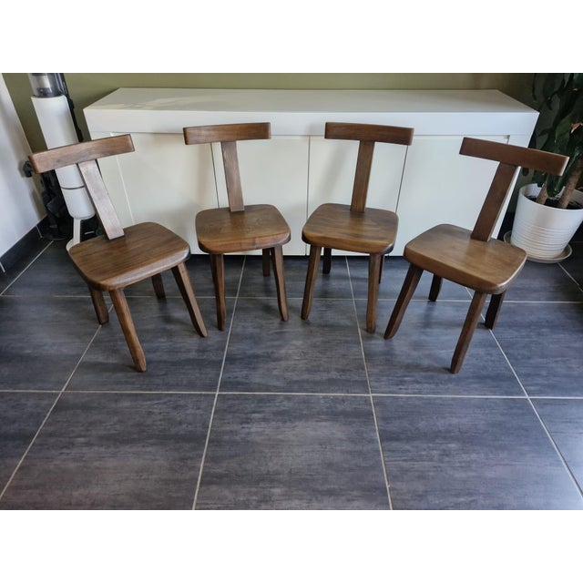Set of four Brutalist chairs by Finnish designer Olavi Hännin, dating from the 1960s. These iconic Model T chairs are...