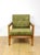 Wooden armchair designed by Z. Baczyk in brown vintage with yellow-olive upholstery. A 1970s armchair with removable...