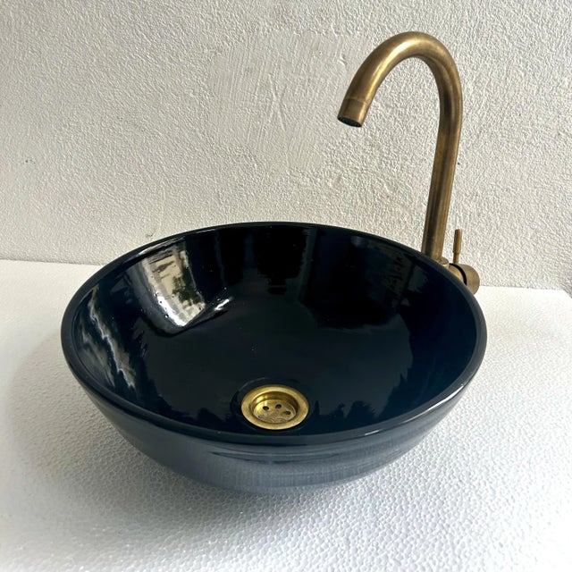 Elevate Your Bathroom with Our Handcrafted Black Sink Bowl Add an element of timeless beauty to your bathroom with our...