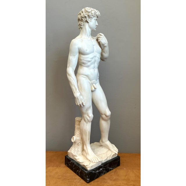 Capturing the timeless grandeur of Renaissance artistry, this vintage Italian sculpture is a finely detailed reproduction...