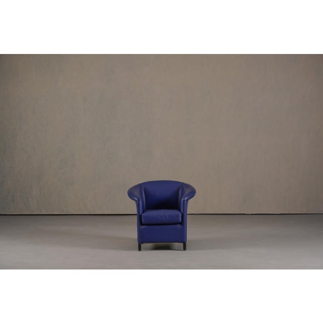 The Wittmann Aura armchair, designed by Paolo Piva for Wittmann, is a refined example of 1980s postmodern European design....