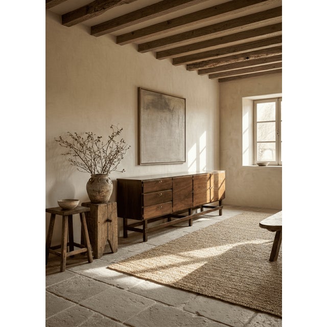 Immerse yourself in the nostalgia of the past with this captivating vintage Brutalist-style sideboard, a masterpiece of...