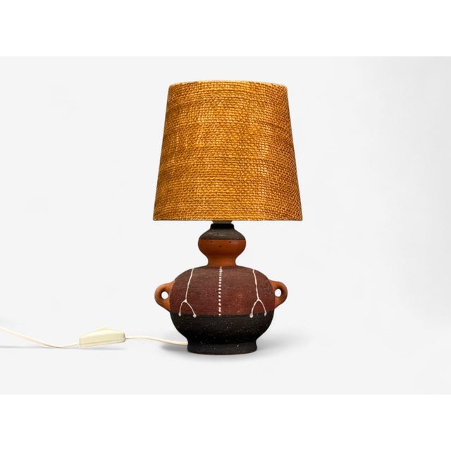 Thomas Hellström, Swedish Mid-Century Modern, Ceramic, Fabric, Table Lamp, Sweden, 1970s A “Gubbe” table lamp designed by...