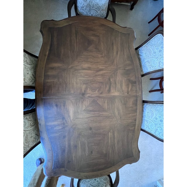 This Country French dining set from Mount Airy Furniture Co. was crafted in the mid 70s and boasts exceptional...