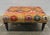 George Smith Standard ottoman in colorful kilim on turned mahogany legs.