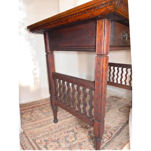 We'd call this 'Enhanced Arts & Crafts' due to the embellishments beyond standard examples of the style. From England...