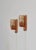 Wonderful set of Danish Modern wall lamps in solid Scandinavian pinewood and amber colored glass shades. The lamps were...