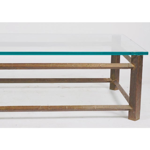 Sometimes the simplest designs leave the strongest impression. This striking handcrafted coffee table features a...