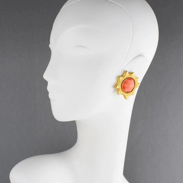 These stunning clip-on earrings were designed by renowned French fashion designer Chantal Thomass. The pieces feature a...