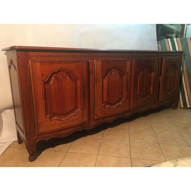 A large chest of drawers, in my opinion, made of apple or pear wood in the 1950s. With dimensions of: - 258 width - 106.5...