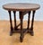 Antique English oak table from the 20th century, crafted in the Jacobean Revival style. The piece features turned legs...