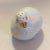 Charming bone china salt shaker in perfect condition. White with hand-painted gold and black embellishments. Cork at...