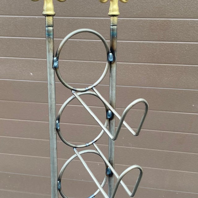 A high quality wine tower of welded steel construction with brushed finish and gold flour-de-lys detail. Base diameter...