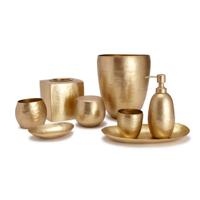 Add regal flair to your bath with our Nile accessories. Crafted from brass, each vibrant piece is fashioned into curved...