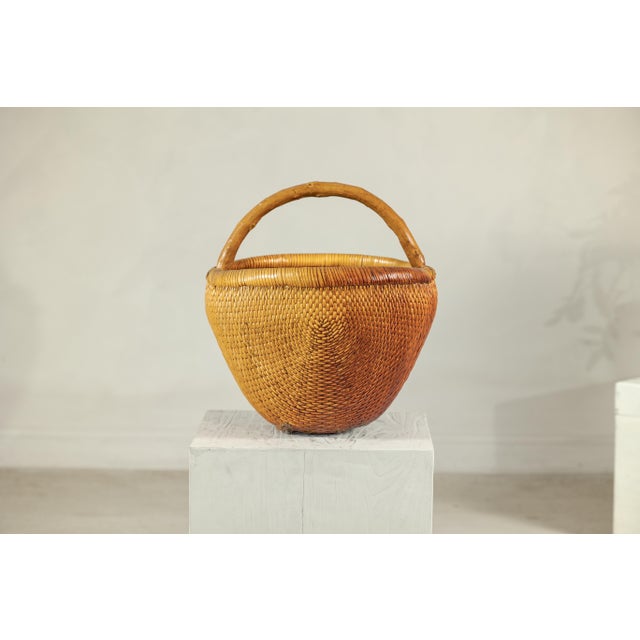 Vintage Chinese Handwoven Rattan Carrying Basket with Arched Handle For Sale - Image 17 of 18