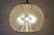 Bubbel pendant light from the German company Doria. The lamp features a very large sphere made of foam glass, inside an...