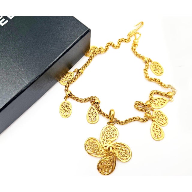 Chanel Vintage Gold Plated CC Filigree Paisley Necklace *Marked 95 *Made in France *Comes with the original box -The total...