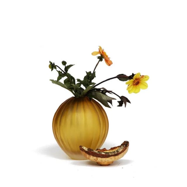 Amber Poppy stacking vessel, Pia Wüstenberg Dimensions: D 17 x H 25 Materials: cut glass, wood with its sculpted glass...