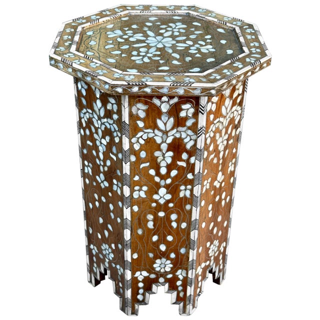 Beautiful mid 19th century mother of pearl inlaid octagonal accent table. Floral pattern of natural shell with silver...