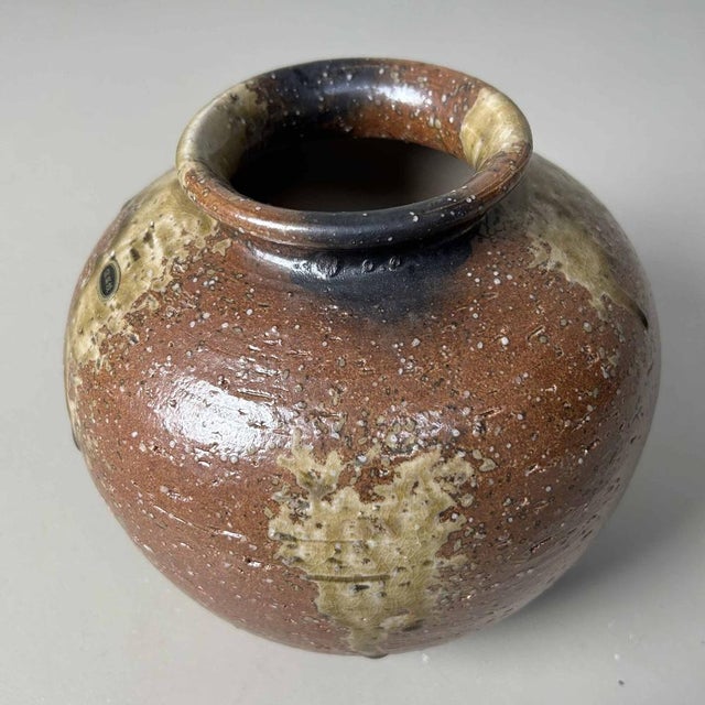 Beautiful Shigaraki flower vase from the '60s-'70s, featuring a natural color palette achieved through the wood-fired...