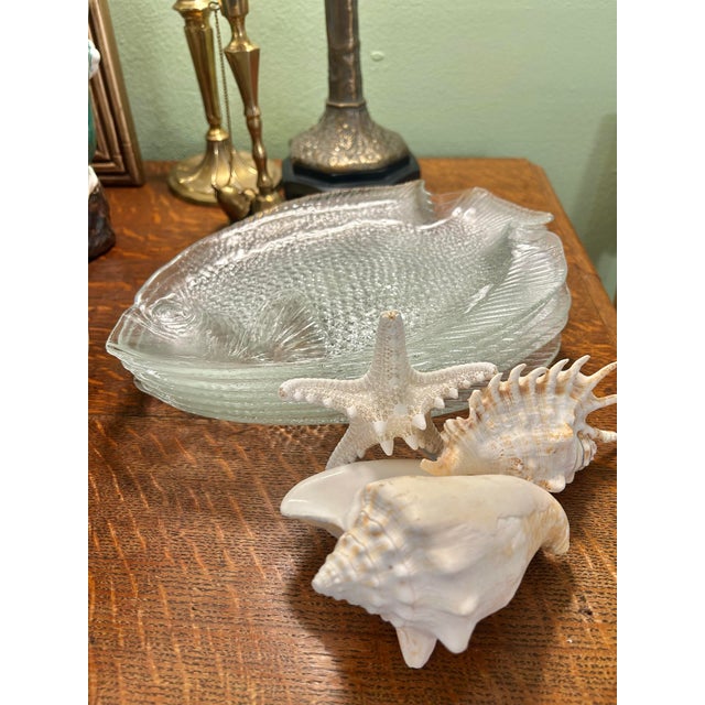 These plates are classics from Arcoroc of France. Made in the 1970’s of tempered glass, they feature a molded fish scale...
