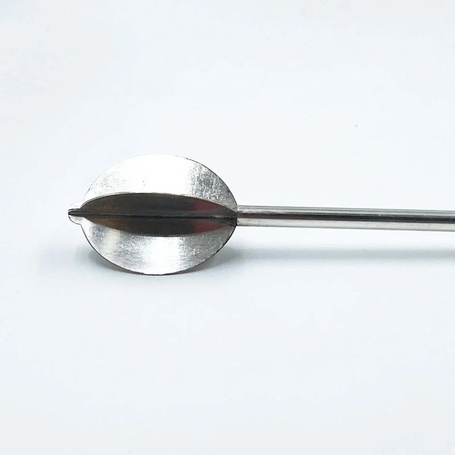 A Vintage silver plate lemonade mixer or muddler, American.