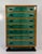 Refined Italian chest of drawers from the 1950s, distinguished by an elegant combination of emerald green parchment,...