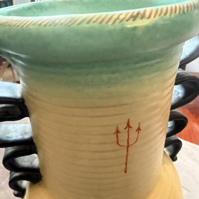 This 1930s Art Deco ceramic vase by Deruta is a masterful representation of the Italian Futurist movement, characterized...