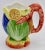 A unique vintage Italian ceramic pitcher with clam shell design, and lobster handle. "Made in Italy" stamped on the...