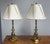 Design Plus Gallery presents a pair of Vintage Neoclassical Brass Dolphin Table Lamps by Frederick Cooper. This matching...