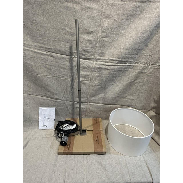 Offered for sale is an authentic, pristine, showroom-tier Santa & Cole TMD Table Lamp, designed by the master of Spanish...