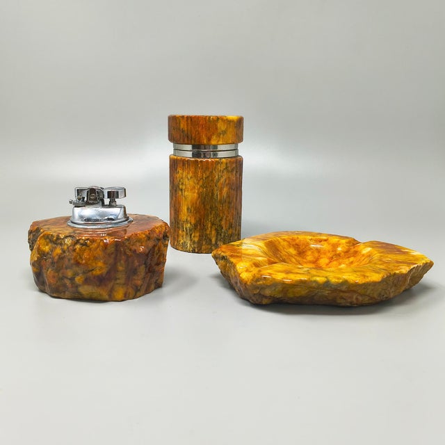 Authentic three-piece smoking set designed by the celebrated italian artisan romano bianchi during the 1960s. Masterfully...