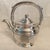 Up for sale is a rare, authentic piece of West Coast culinary history: an individual-sized (8 oz.) silver-soldered teapot...