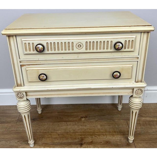 Add timeless vintage charm to your home with this elegant pair of Vintage Shabby Chic bedside tables. Featuring a...