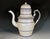 Castleford-Type White Stoneware Coffeepot, Blue Lined, English Regency England, circa 1820 A tall, architectural white...