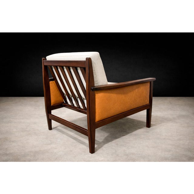 An architecturally assertive armchair by Fátima Arquitetura e Interiores, crafted in Brazil during the 1960s and executed...