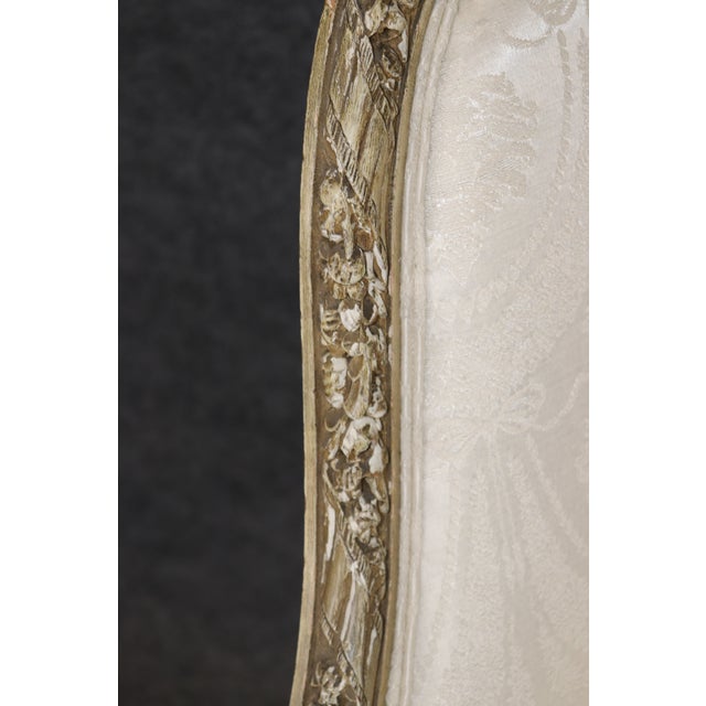French Louis XVI Creme Painted Tall Back Heavily Carved Bergere Chair For Sale - Image 10 of 12