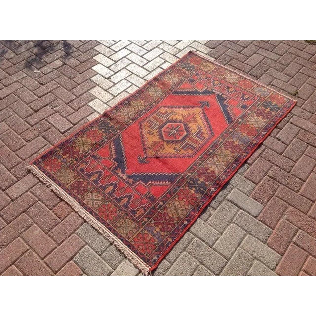 This gorgeous hand knotted Vintage Anatolian area rug is approximately 60 years old in excellent vintage condition. The...