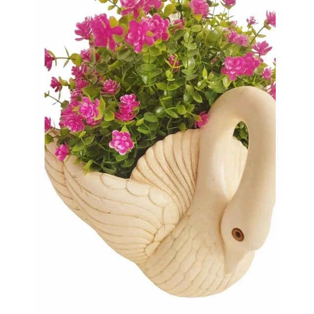 A beautiful and rare vintage off white swan wall pocket. The pocket has highly carved details, made of a hard resin...