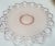This lovely, nearly 100 years old pale pink "Depression Glass" cake/serving platter is absolutely precious. The...