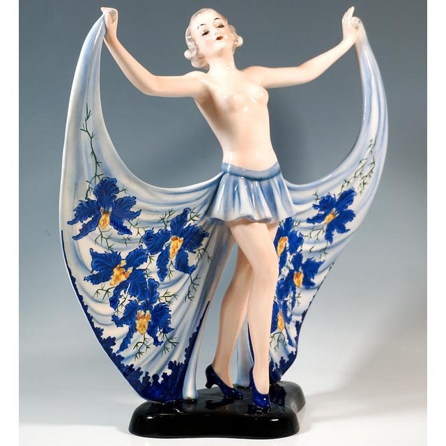 Very rare goldscheider ceramic figurine: young female revue dancer with chin-length hair and bare torso in light blue...