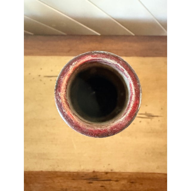 This Alvino Bagni for Raymor vase features a distinctive black glaze with red hand-painted floral damask decor. Produced...