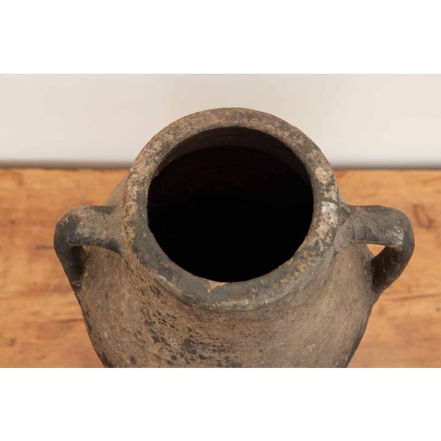 Vintage Medium Black Olive Pot Discover the timeless charm of our Vintage Medium Black Olive Pot, a testament to the...