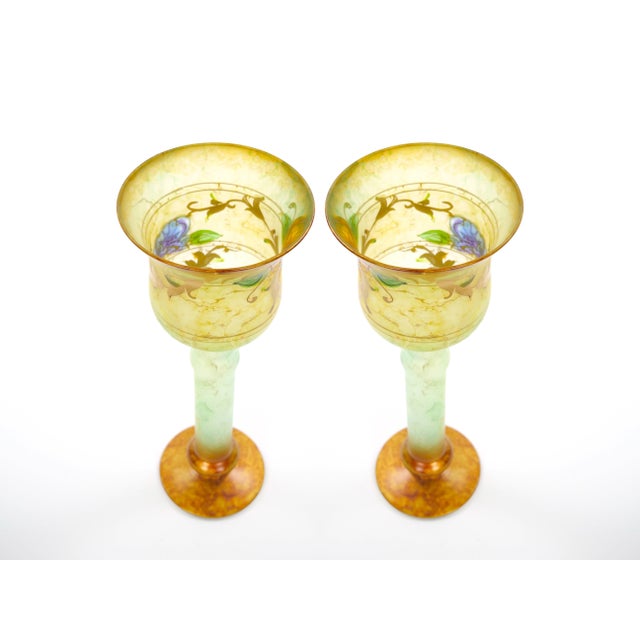 This elegant pair of Italian Venetian art glass candlestick was made in Italy in the late 20th century and reflects the...