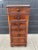 An exquisite 19th-century French walnut nightstand showcasing exceptional marquetry craftsmanship, elegant proportions,...